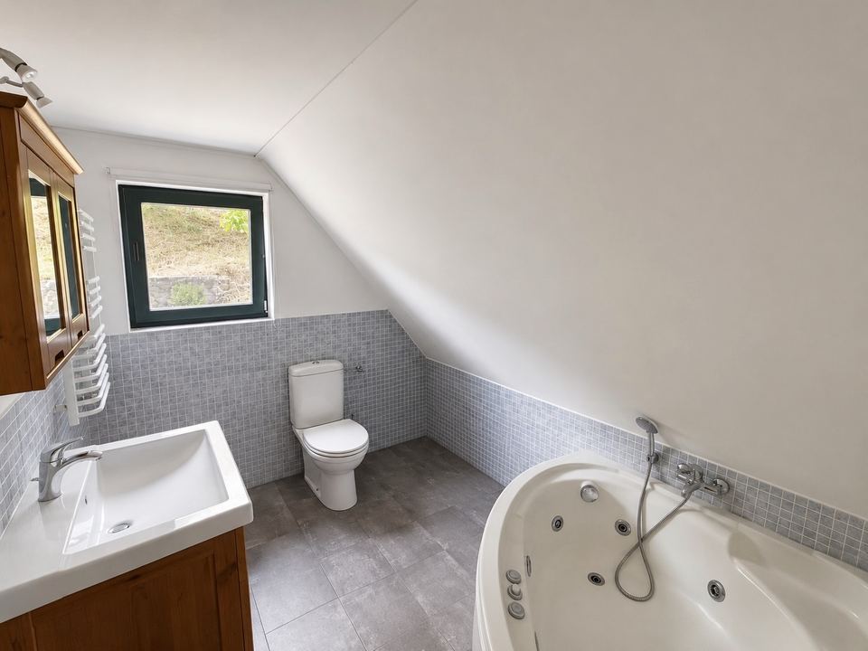 Bathroom with whirlpool bathtub