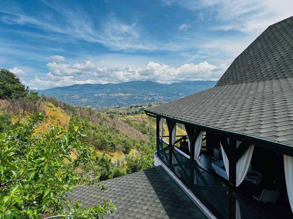Roof and veranda of Villa Victoria overlooking the valley