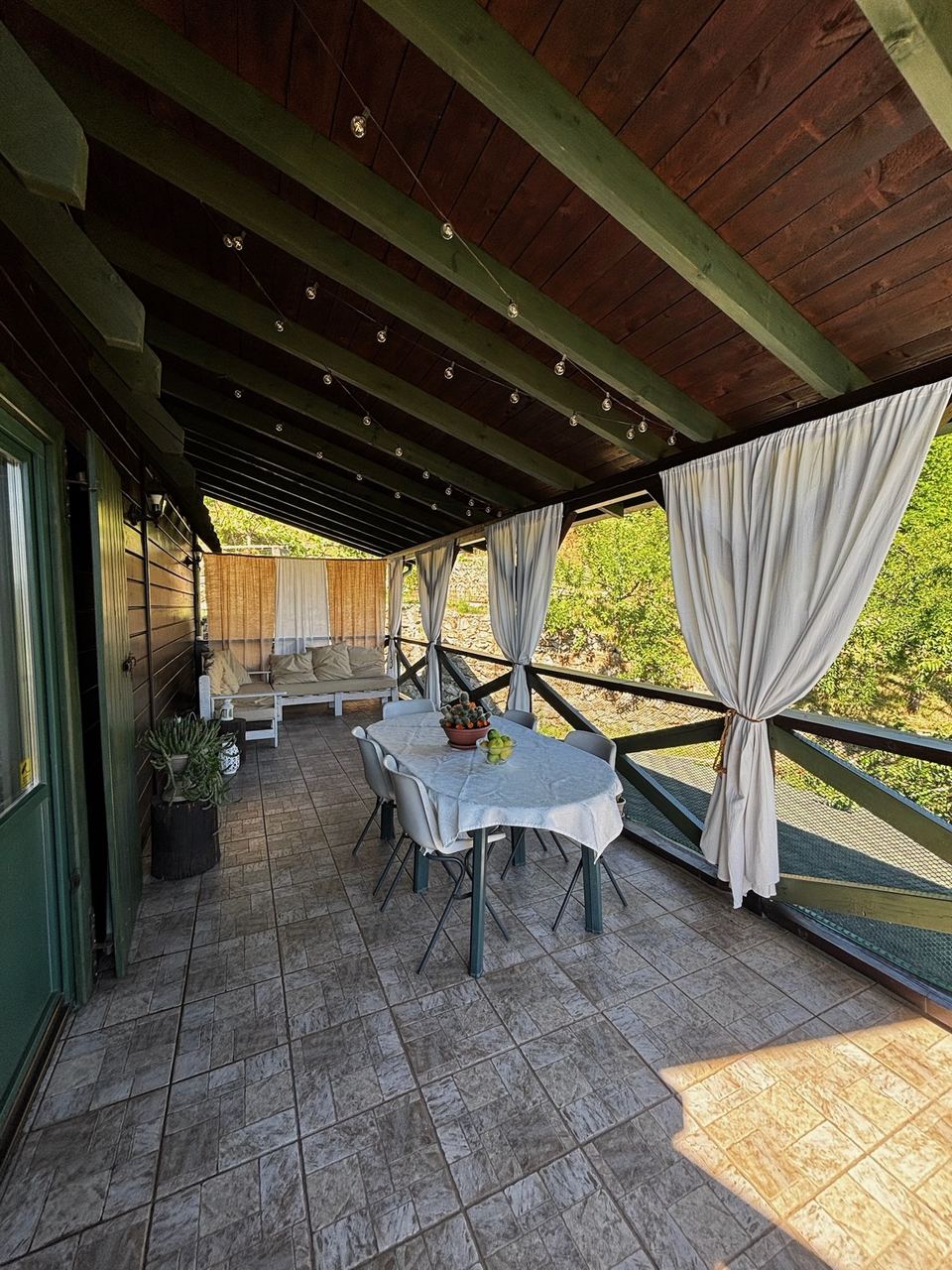 Breakfast table on the covered veranda